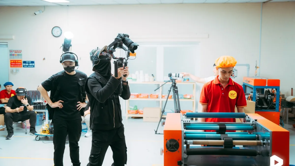 The corporate film crew of the label and stamp industry at Nam Viet printing factory.