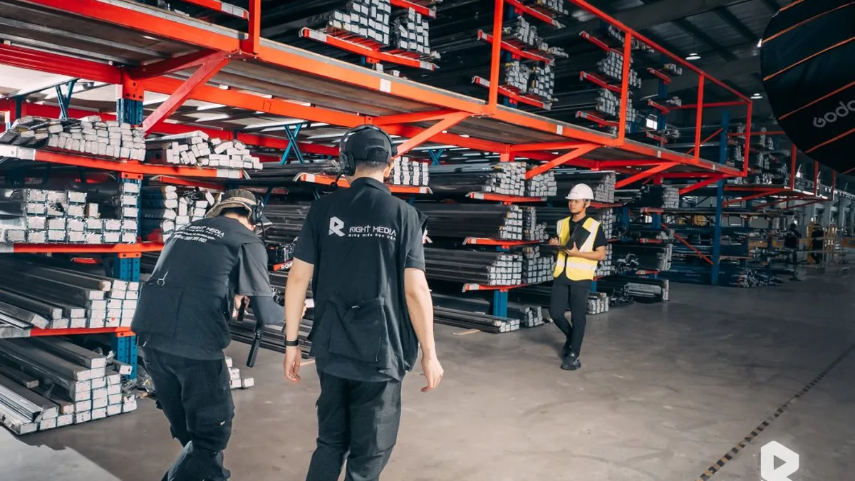 The crew moves through the aluminum bar warehouse at the Fletcher plant.