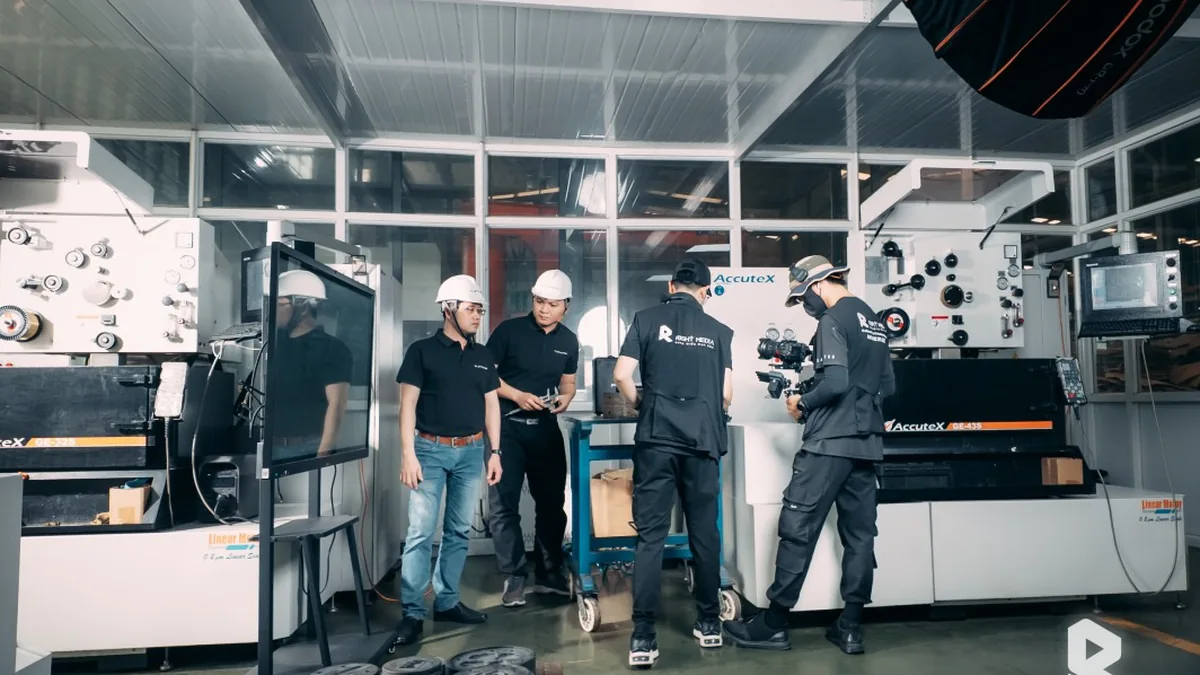 Filming the aluminum door processing line at the Fletcher factory.