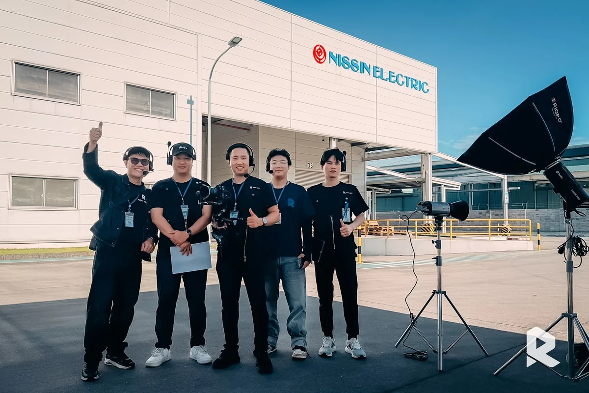 The Right Media team and Nissin Electric representatives at the factory before filming.