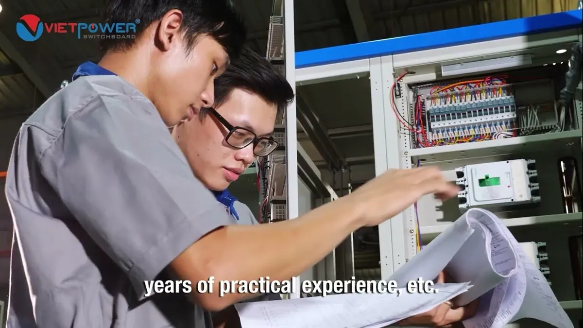 VIETPOWER's corporate video on electrical cabinets featuring an engineer inspecting electrical cabinets.